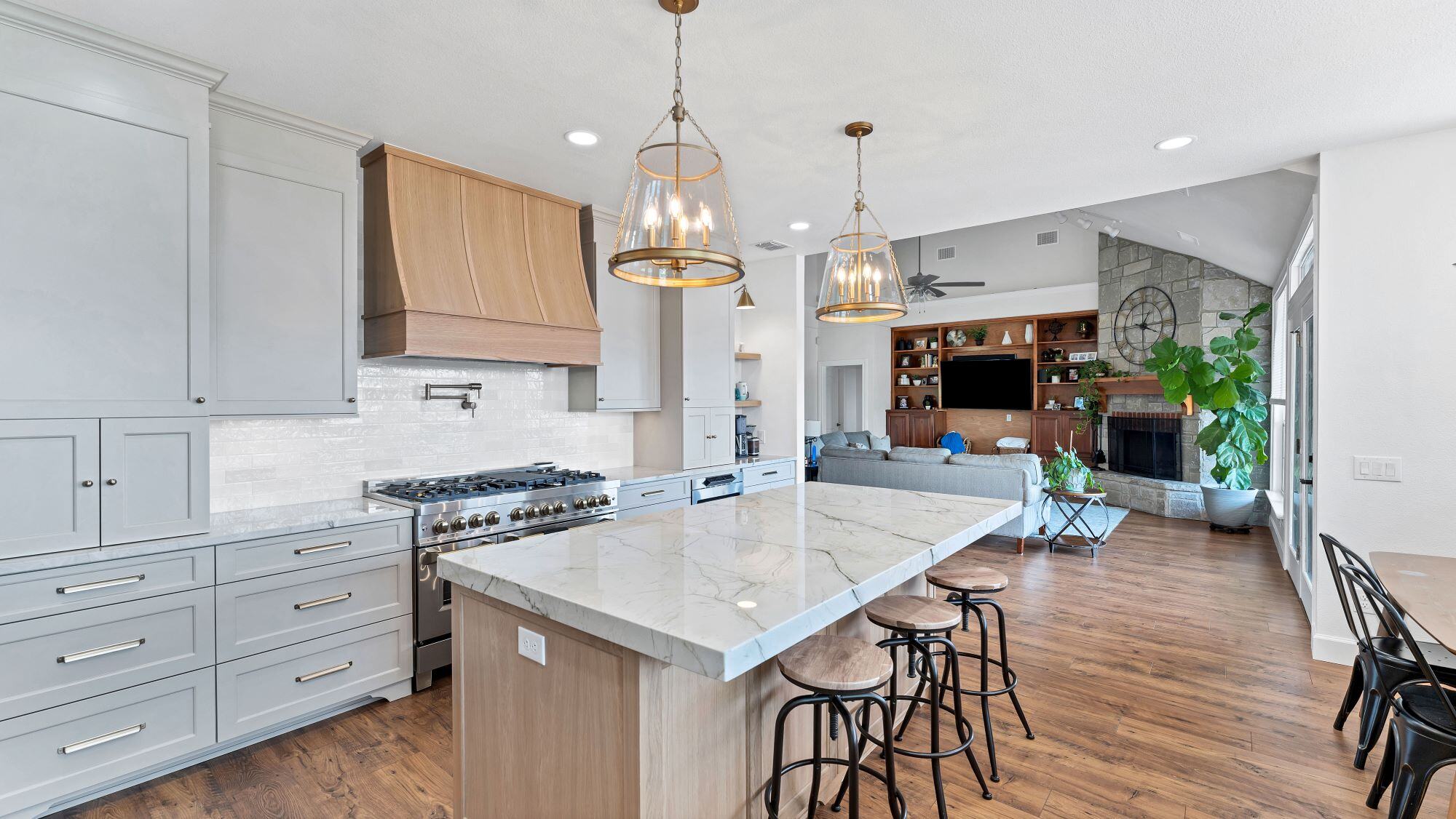 Renovated Kitchen with Drawer Storage and Seating at a Large Island