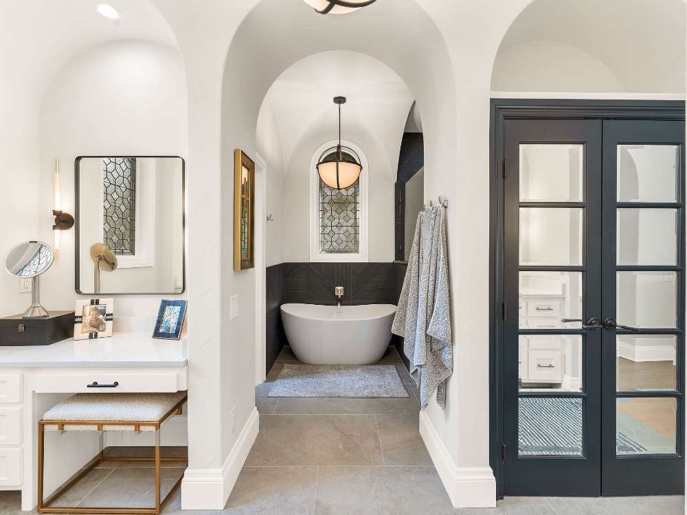 San Antonio bathroom remodel featuring freestanding tub and tile floor by Hill Haven Homes San Antonio bathroom remodel featuring freestanding tub and tile floor by Hill Haven Homes