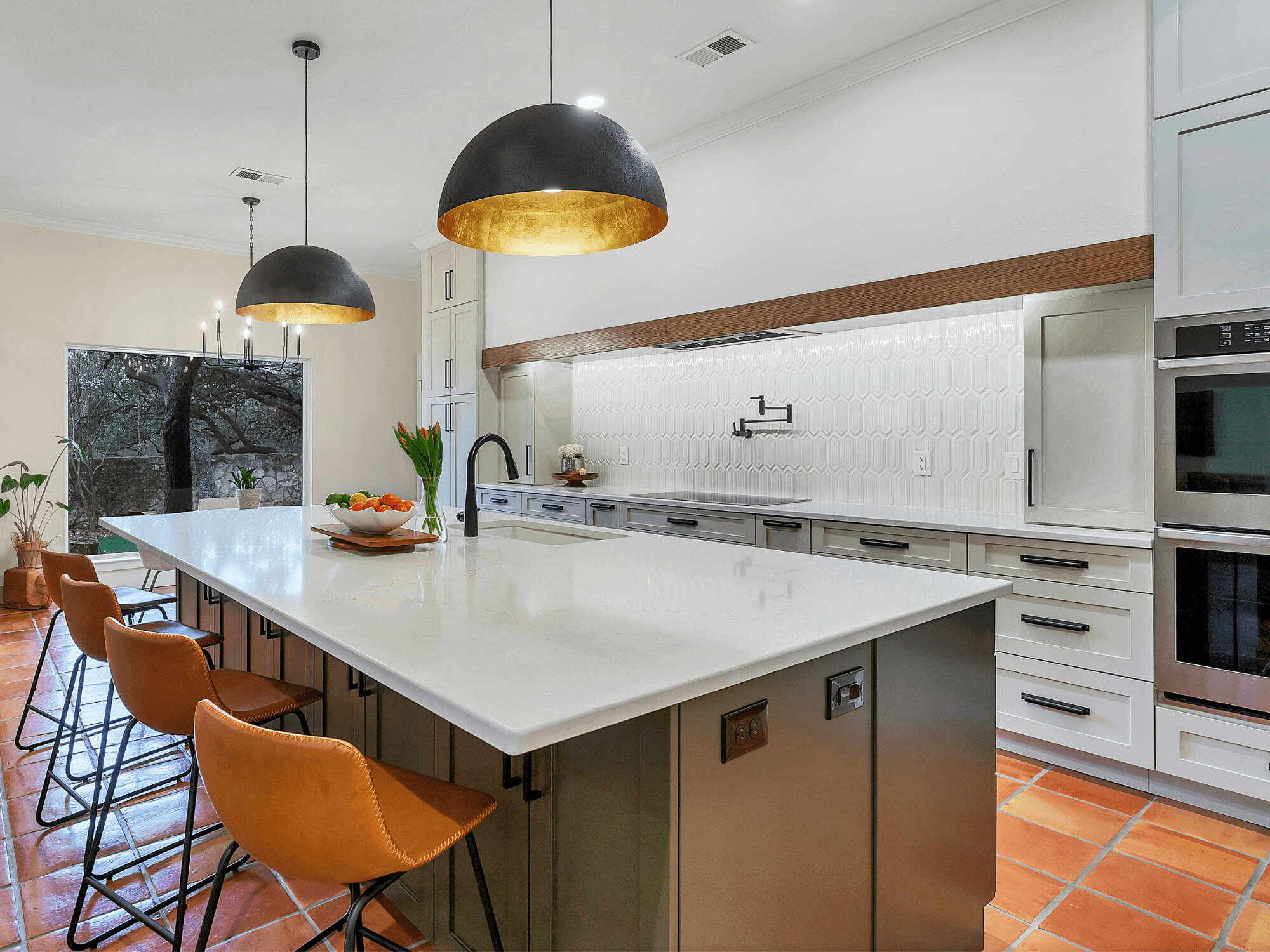 Kitchen Remodel in San Antonio with Larege Island and Terracotta Tile Floor